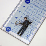 064-00019 JNR Steam Locomotive Crew - Assistant Engineer holding Tablet Carrier : Tiny Tales - Pre-Colored 1:64