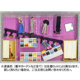 A customer and a shop assistant are trying on clothes. A fitting room is included.