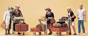Traveller carrying luggage in a carrier carriage: Preiser, complete painted HO (1:87) 10459