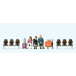 Three travellers sitting on a bench waiting to depart: Preiser, complete painted HO(1:87) 10661