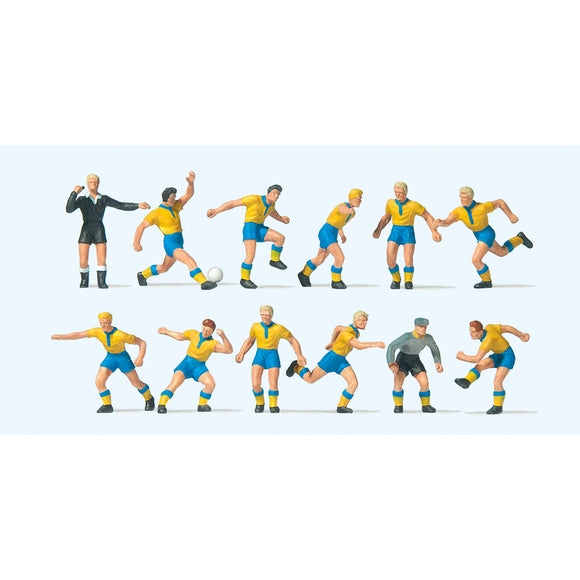 Equipo de fútbol y árbitro (camiseta amarilla, pantalón azul): Preiser, pintado completo HO(1:87) 10755