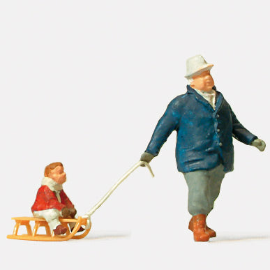 Hombre tirando de un trineo con un niño dentro : Preiser - Painted HO(1:87) 28078