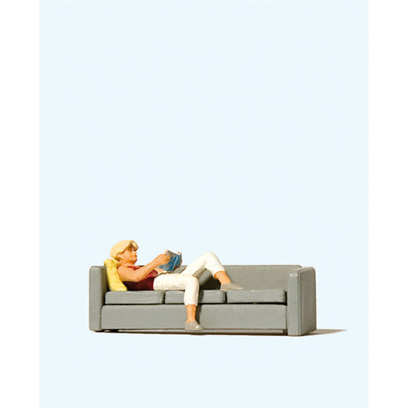 Woman reading on sofa : Preiser - Painted finished product HO(1:87) 28179