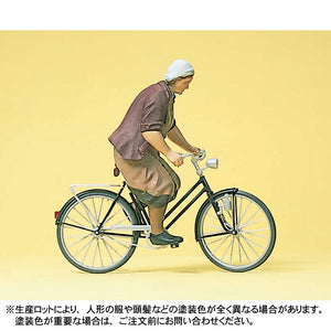 Mujer campesina en bicicleta: Preiser, pintado 1:22,5 45068