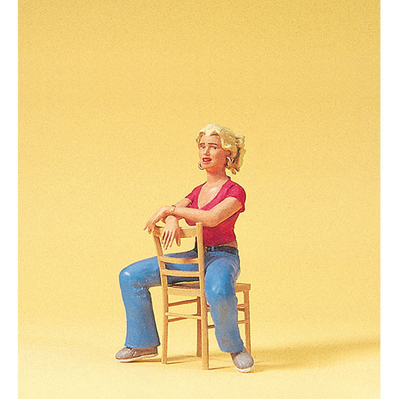 Young lady sitting on a chair : Preiser - painted 1:22.5 scale 45508